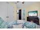Comfortable bedroom with a TV and an ensuite bathroom at 14514 20Th E St, Parrish, FL 34219