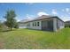 Spacious home with a screened lanai and a large green backyard at 14514 20Th E St, Parrish, FL 34219