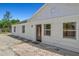 Charming home featuring a lovely front entrance, natural light, and a brick walkway at 1518 Stoeber Ave, Sarasota, FL 34232