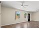 Well-lit living room with hardwood floors and bright natural lighting at 1518 Stoeber Ave, Sarasota, FL 34232