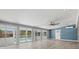 Open living area with sliding glass doors to backyard and pool, providing seamless indoor-outdoor living at 1518 Stoeber Ave, Sarasota, FL 34232