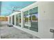 Covered patio overlooking in-ground pool and fenced-in backyard, perfect for outdoor living at 1518 Stoeber Ave, Sarasota, FL 34232