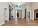 Spacious foyer featuring high ceilings, modern decor, and a stylish front door with sidelights at 1555 Eastbrook Dr, Sarasota, FL 34231