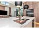 Modern kitchen featuring a large island with seating, stainless steel appliances, and sleek cabinetry at 1555 Eastbrook Dr, Sarasota, FL 34231