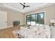 Bedroom view showing the layout, floor plan, and sliding glass door leading to the backyard and pool area at 1555 Eastbrook Dr, Sarasota, FL 34231