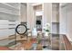 This walk-in closet features custom shelving, drawers, a center island, and plenty of storage at 1555 Eastbrook Dr, Sarasota, FL 34231