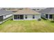 Well-maintained backyard with screened lanai, ideal for outdoor entertaining and relaxation at 16161 61St E Ln, Parrish, FL 34219