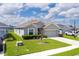 Well-maintained one-story home with tidy landscaping and a two-car garage at 16161 61St E Ln, Parrish, FL 34219