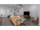 Comfortable living room with stylish furniture, modern decor, and ample natural light at 16161 61St E Ln, Parrish, FL 34219