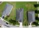 Aerial view showing the home's roof, yard and proximity to neighboring houses at 16848 Rosedown Gln, Parrish, FL 34219