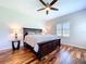 Charming bedroom with hardwood floors, ceiling fan and plenty of natural light at 16848 Rosedown Gln, Parrish, FL 34219