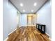 A spacious foyer boasting wood floors and ample lighting at 16848 Rosedown Gln, Parrish, FL 34219