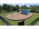 Community playground featuring swings, slides, and climbing structures, perfect for Gathering fun at 16848 Rosedown Gln, Parrish, FL 34219