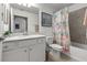 A bright bathroom features a vanity, toilet, and a shower-tub combo at 17902 Gawthrop Dr # 107, Bradenton, FL 34211