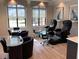 Bright salon area with chairs, tables, and foot bath stations for manicures and pedicures at 17902 Gawthrop Dr # 107, Bradenton, FL 34211