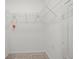Walk-in closet with wire shelving, providing ample storage space at 17902 Gawthrop Dr # 107, Bradenton, FL 34211