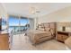 Main bedroom featuring ocean view and large windows with custom dresser at 1800 Benjamin Franklin Dr # B310, Sarasota, FL 34236