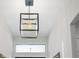 Modern entryway light fixture, highlighting the architectural details and contemporary design of the home at 1842 Kenilworth St, Sarasota, FL 34231