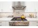 Close-up of a stainless steel stove at 1842 Kenilworth St, Sarasota, FL 34231