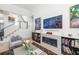 Bright living room featuring a modern fireplace, hardwood floors, and minimalist decor, creating a stylish space at 1842 Kenilworth St, Sarasota, FL 34231
