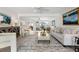 Bright living room featuring luxury furnishings and open concept design with view of the water at 1907 4Th W St, Palmetto, FL 34221