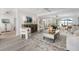 Bright living room featuring luxury furnishings, decor, and open concept design with view of the water at 1907 4Th W St, Palmetto, FL 34221