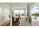 Outdoor porch with water views, cozy seating, and stylish outdoor rug at 1907 4Th W St, Palmetto, FL 34221