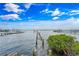 Scenic water view featuring weathered docks and vegetation, capturing the serene waterfront environment at 1907 4Th W St, Palmetto, FL 34221