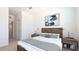 Well-lit bedroom with neutral decor and furnishings at 20398 Lagente Cir, Venice, FL 34293