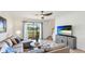 Bright living room with water view at 20398 Lagente Cir, Venice, FL 34293