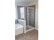 Modern bathroom featuring a bathtub and glass-enclosed shower at 215 63Rd E Dr, Bradenton, FL 34203