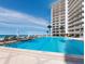 Community pool overlooking the ocean at 2301 Gulf Of Mexico Dr # 36N, Longboat Key, FL 34228