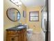 Bathroom with a custom vanity and sink, glassed in shower with tile flooring at 2609 Webber St, Sarasota, FL 34239