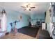 Home gym featuring exercise bike, weight machine, punching bag, and ample workout space at 2609 Webber St, Sarasota, FL 34239