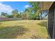 Expansive backyard with privacy fence, ideal for outdoor activities and entertaining at 2906 Arlington St, Sarasota, FL 34239