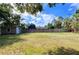 Large, private backyard with a shed and sturdy wooden fence, perfect for outdoor enjoyment at 2906 Arlington St, Sarasota, FL 34239