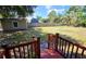 Backyard view from the porch steps with a shed and a privacy fence at 2906 Arlington St, Sarasota, FL 34239