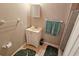 Bathroom features a vanity with storage, a mirror, and a shower with a glass door at 2906 Arlington St, Sarasota, FL 34239