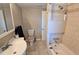 Bathroom features a bathtub with shower, toilet and vanity sink at 2906 Arlington St, Sarasota, FL 34239