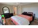 Spacious bedroom with a comfortable bed, dresser, and ample natural light at 2906 Arlington St, Sarasota, FL 34239