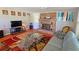 Cozy living room with brick fireplace, modern decor and a leather couch at 2906 Arlington St, Sarasota, FL 34239
