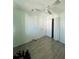 Bright bedroom featuring wood-look floors, closet, and ceiling fan at 3101 Bee Ridge Rd # 221, Sarasota, FL 34239