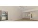 Spacious living room featuring natural light from a window with a view of the outdoors at 314 Pembroke Ln # 189, Venice, FL 34293