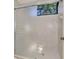Shower features neutral tile with glass doors and bright natural light at 314 Pembroke Ln # 189, Venice, FL 34293