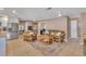 Open living room with tile floors, ceiling fans, and comfortable seating at 322 Linden Dr, Ellenton, FL 34222
