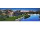 Stunning waterfront home features a private pool, lush landscaping, and tranquil views at 3272 Bayou Rd, Longboat Key, FL 34228
