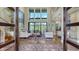 Bright and airy living room with soaring ceilings, wood floors, and comfortable seating at 3272 Bayou Rd, Longboat Key, FL 34228