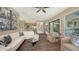 Open-concept living area showcases a seamless flow into the kitchen and multiple seating areas at 3272 Bayou Rd, Longboat Key, FL 34228