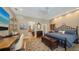 Spacious main bedroom boasting wood floors, neutral walls, and a decorative rug at 3272 Bayou Rd, Longboat Key, FL 34228