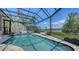 Relaxing screened-in pool area with comfortable seating and beautiful views at 3272 Bayou Rd, Longboat Key, FL 34228
